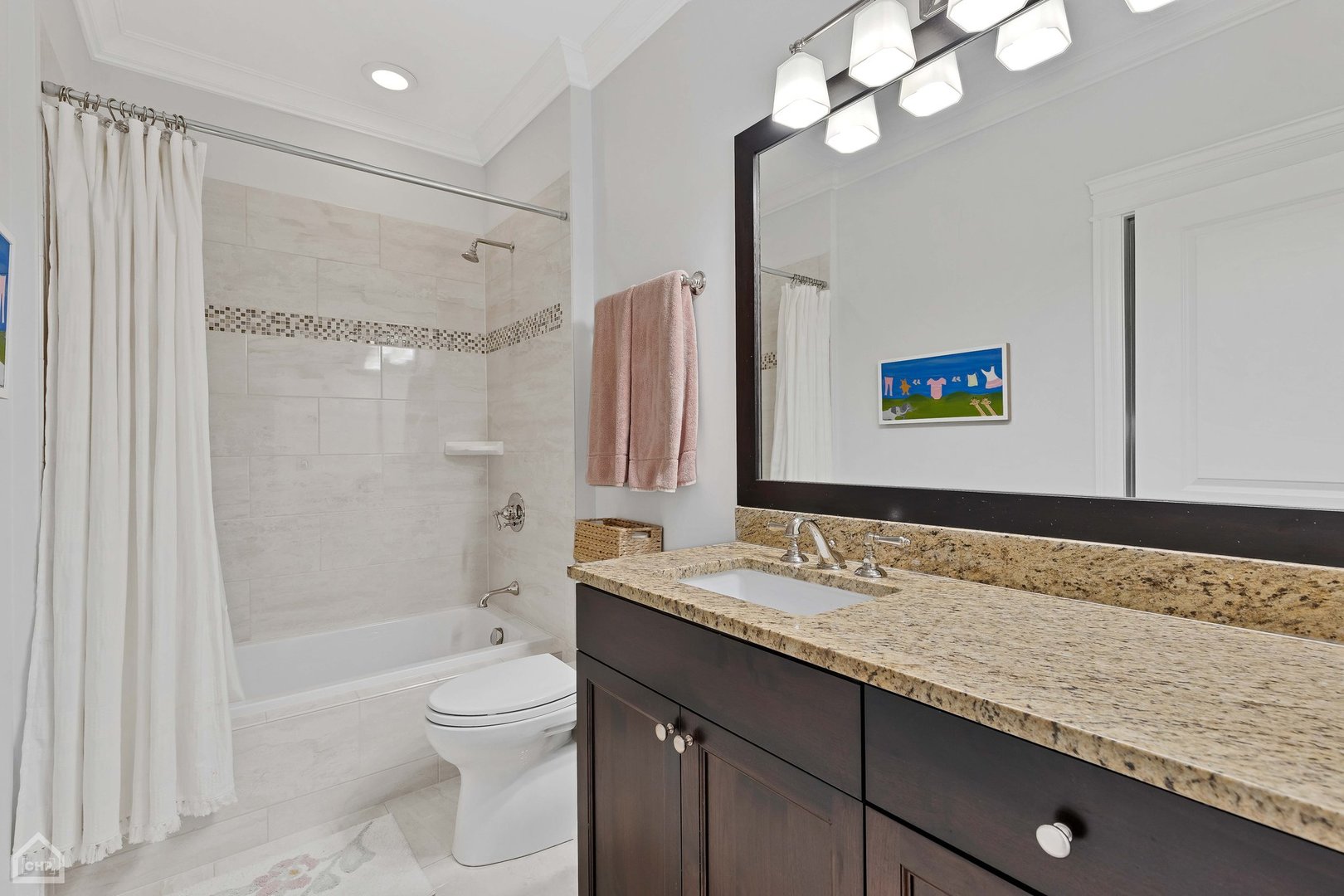 2242 North Seminary Avenue, Unit 1 Chicago, IL 60614 - Photo 21 of 37 a bathroom with a granite countertop sink a toilet a mirror a bathtub and shower