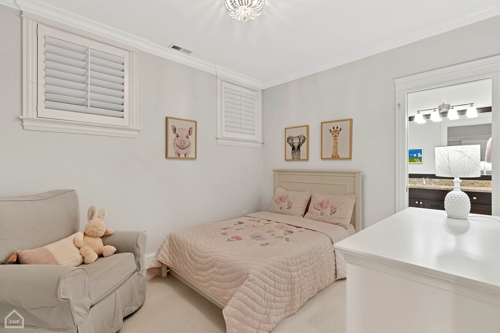 2242 North Seminary Avenue, Unit 1 Chicago, IL 60614 - Photo 22 of 37 a bedroom with a bed and a table