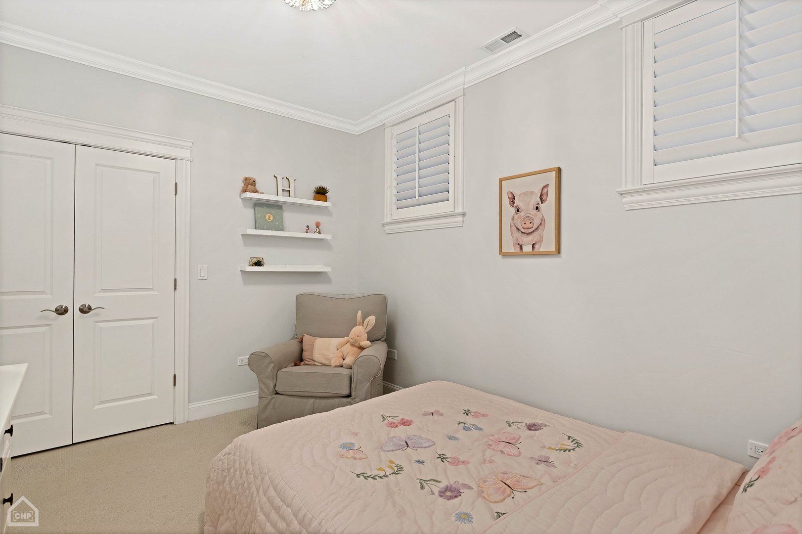 2242 North Seminary Avenue, Unit 1 Chicago, IL 60614 - Photo 23 of 37 a bedroom with a bed and hallway