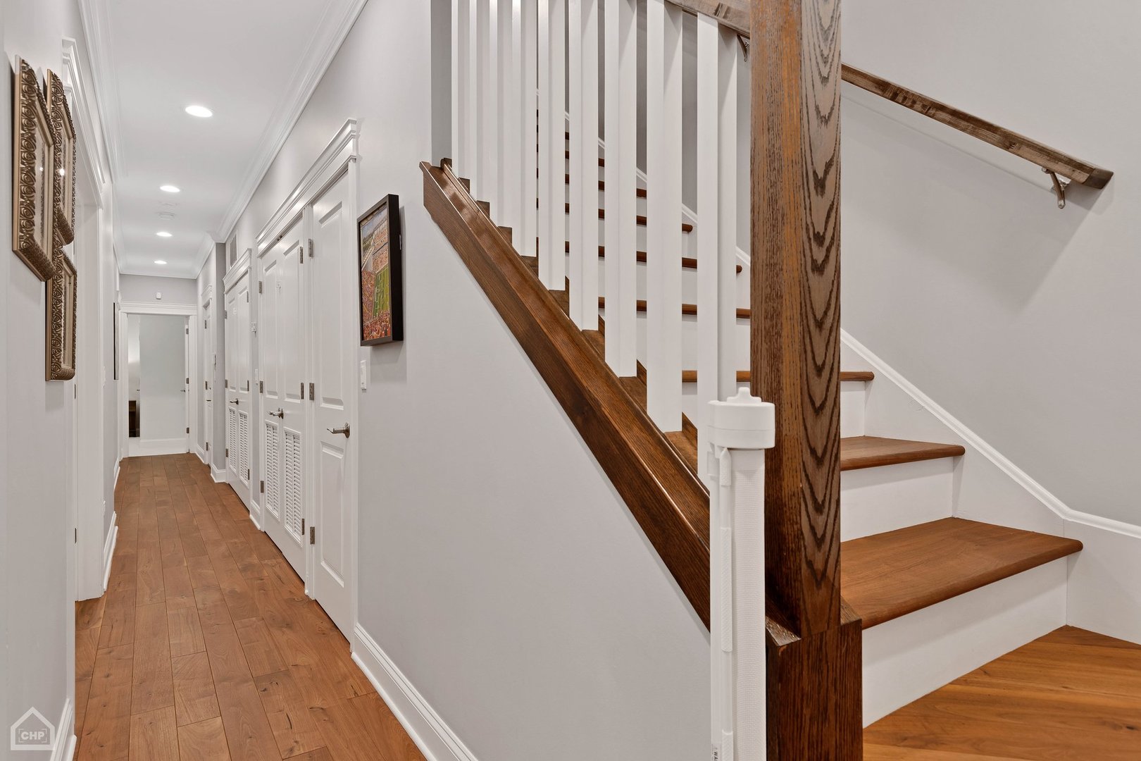 2242 North Seminary Avenue, Unit 1 Chicago, IL 60614 - Photo 26 of 37 a view of a hallway with wooden floor and staircase