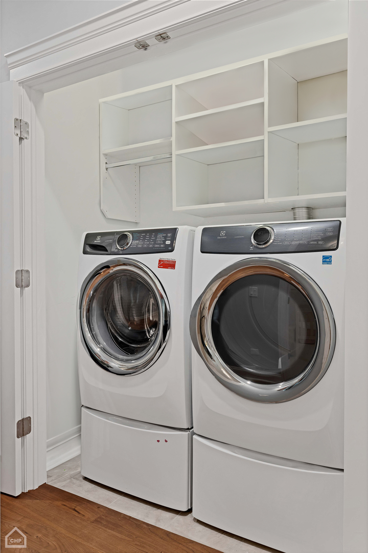 2242 North Seminary Avenue, Unit 1 Chicago, IL 60614 - Photo 27 of 37 a utility room with dryer and washer