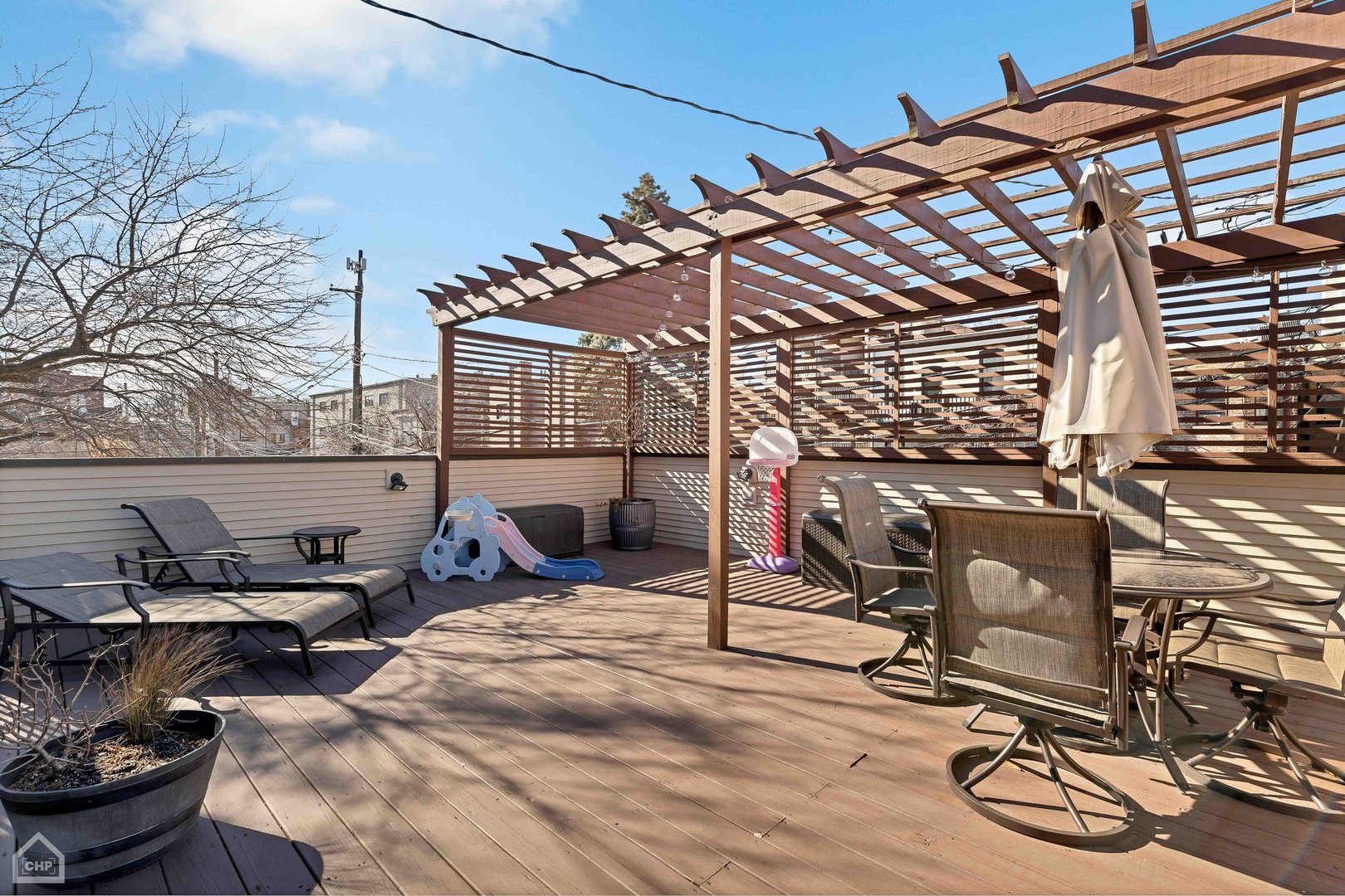 2242 North Seminary Avenue, Unit 1 Chicago, IL 60614 - Photo 32 of 37 a view of a patio with glass top table and chairs