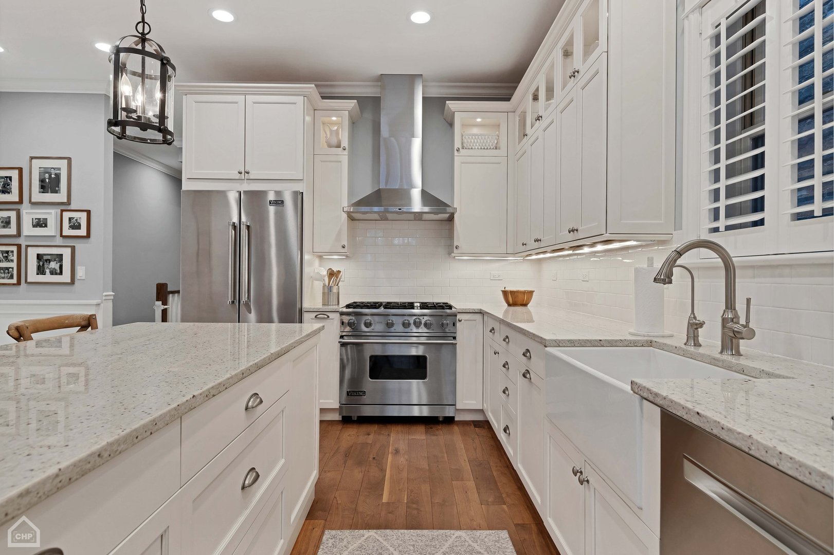 2242 North Seminary Avenue, Unit 1 Chicago, IL 60614 - Photo 9 of 37 a kitchen with stainless steel appliances granite countertop a sink stove and refrigerator