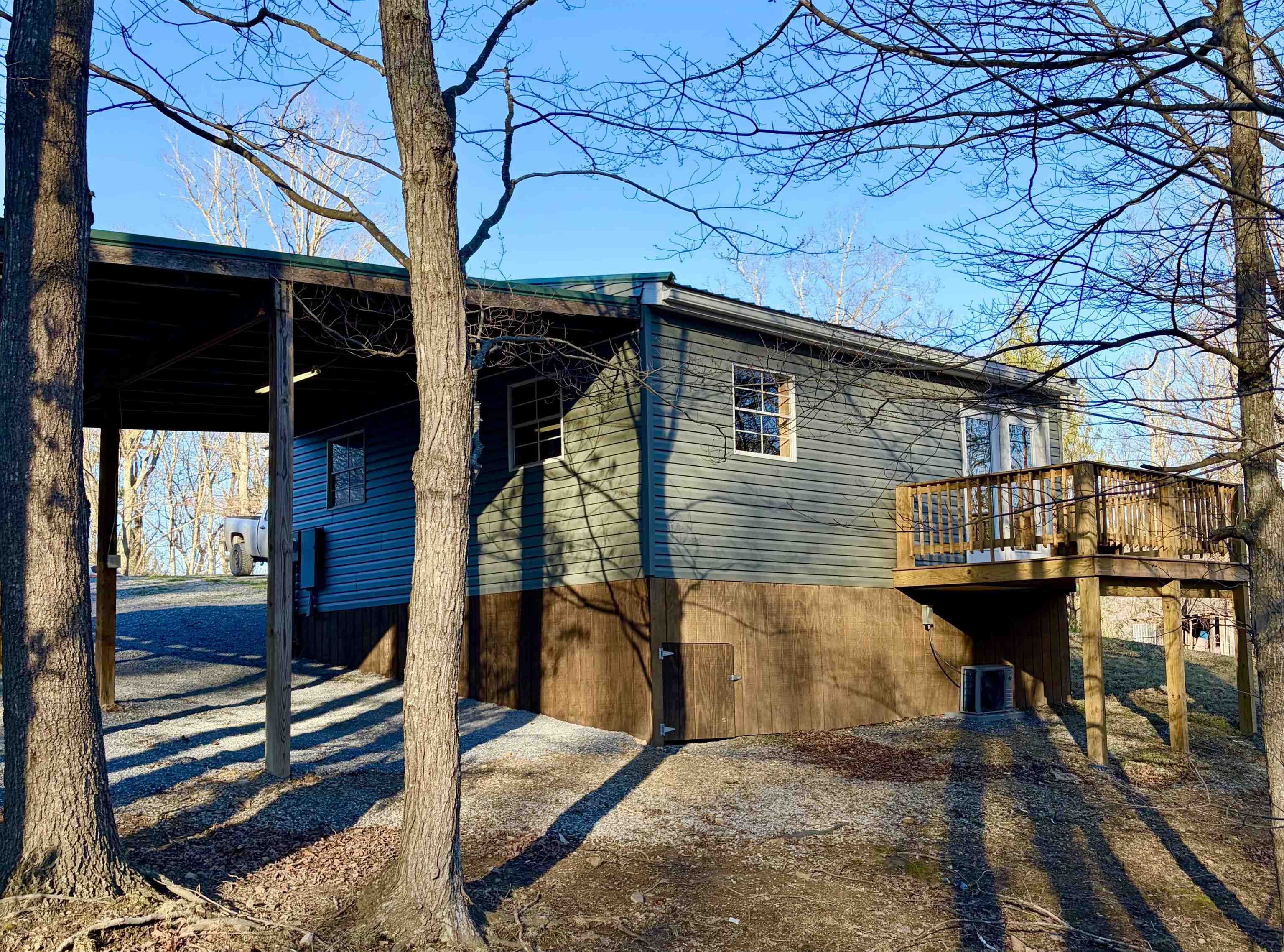 341 Buttercup Drive Mathias, WV 26812 - Photo 3 of 16 a view of a house with a patio