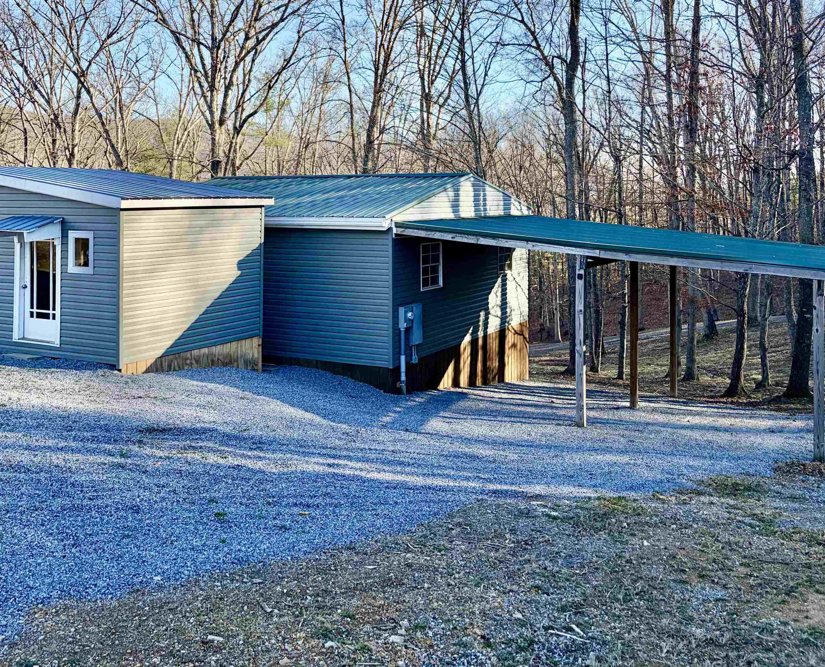 341 Buttercup Drive Mathias, WV 26812 - Photo 4 of 16 a view of a house with backyard and trees