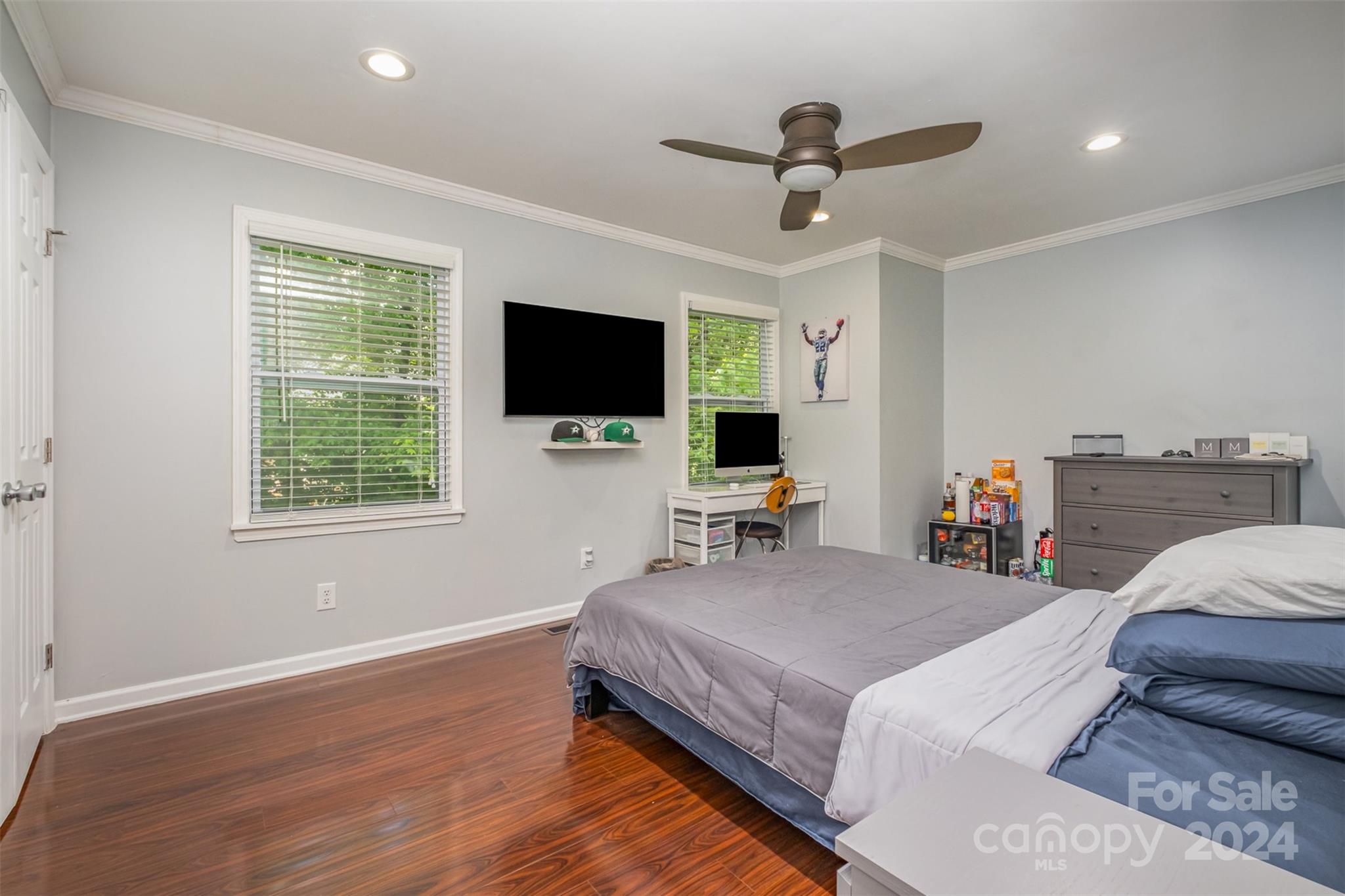 6200 Old Providence Road Charlotte, NC 28226 - Photo 14 of 24 a bedroom with a bed and a flat screen tv