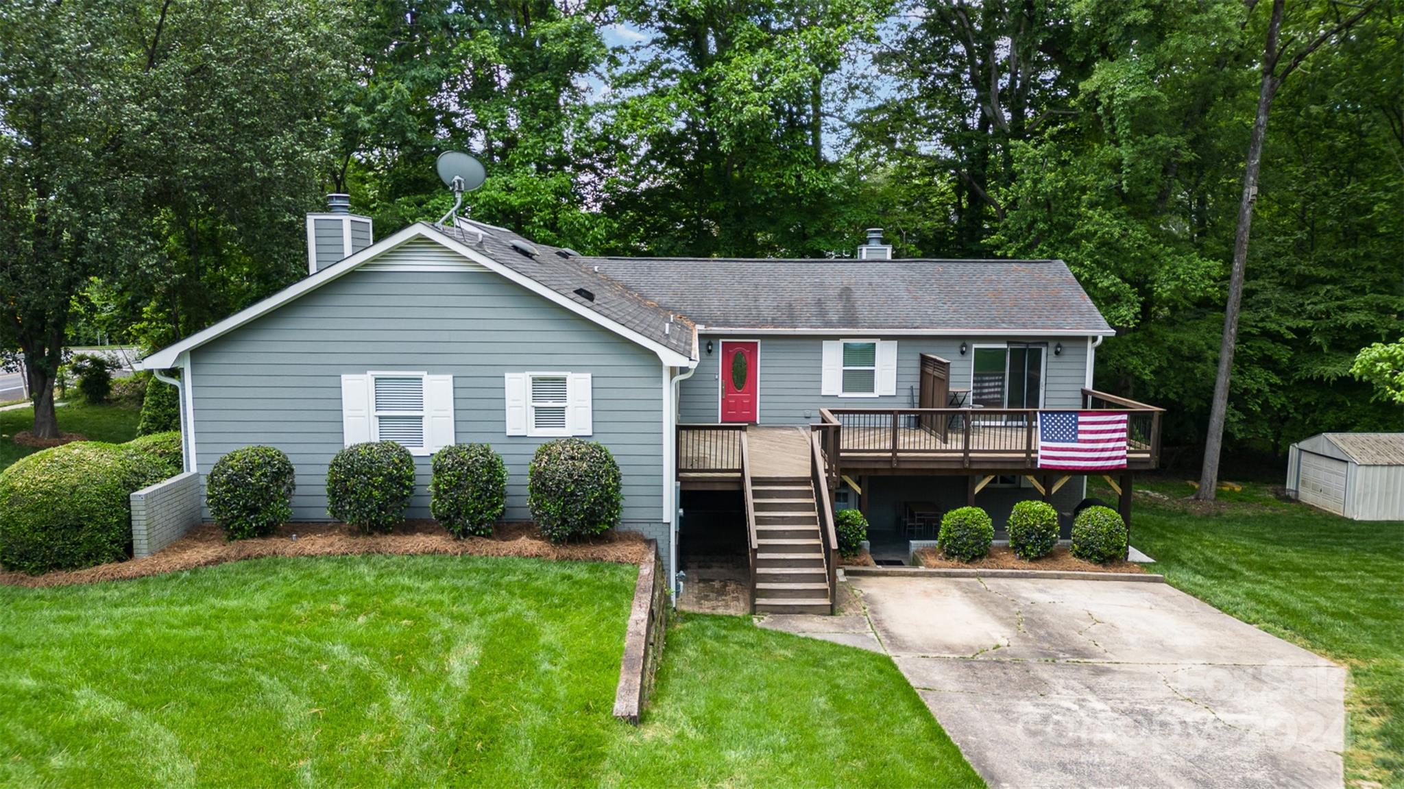 6200 Old Providence Road Charlotte, NC 28226 - Photo 5 of 24 a front view of house with yard and green space