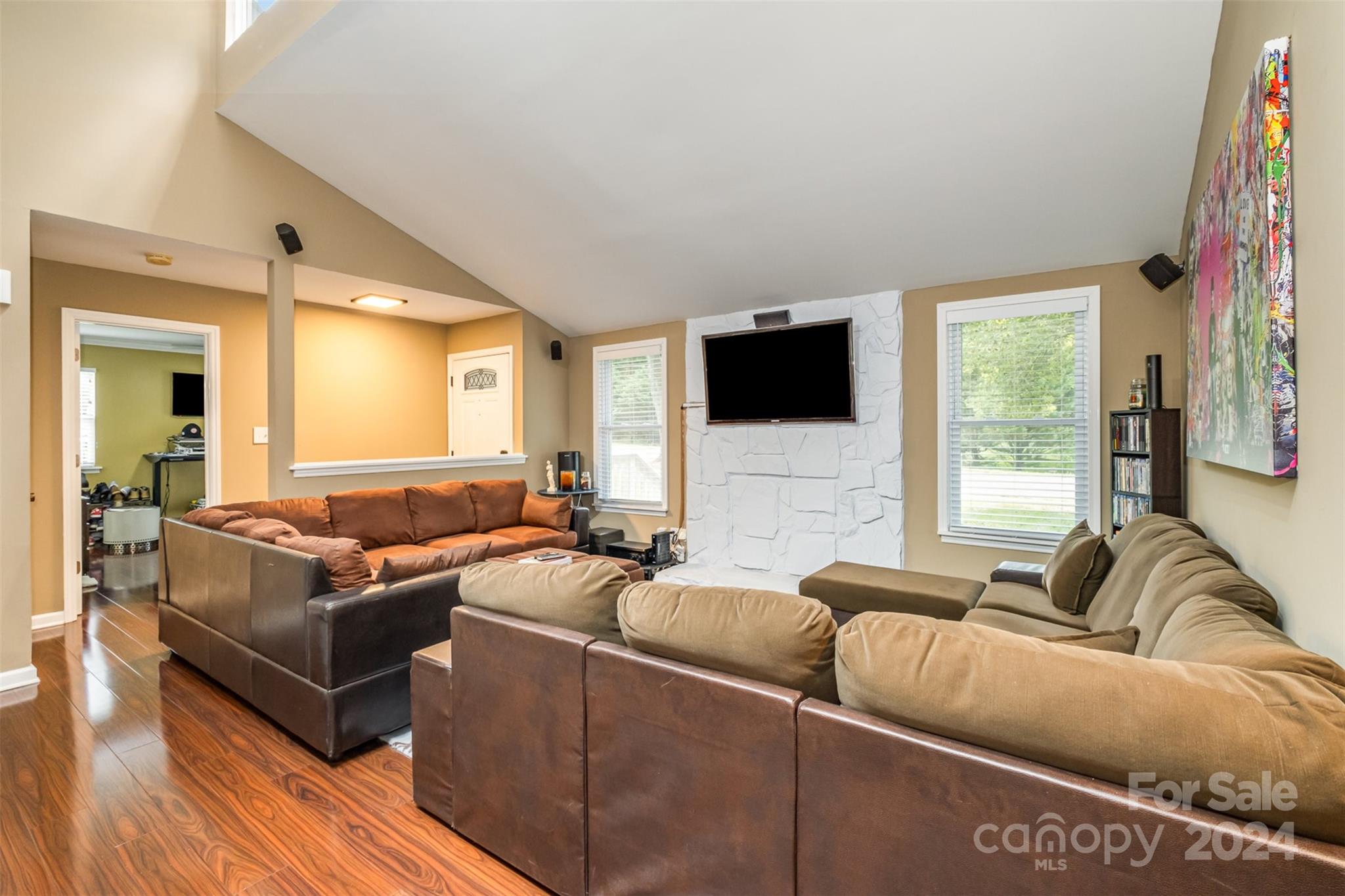 6200 Old Providence Road Charlotte, NC 28226 - Photo 8 of 24 a living room with furniture and a flat screen tv