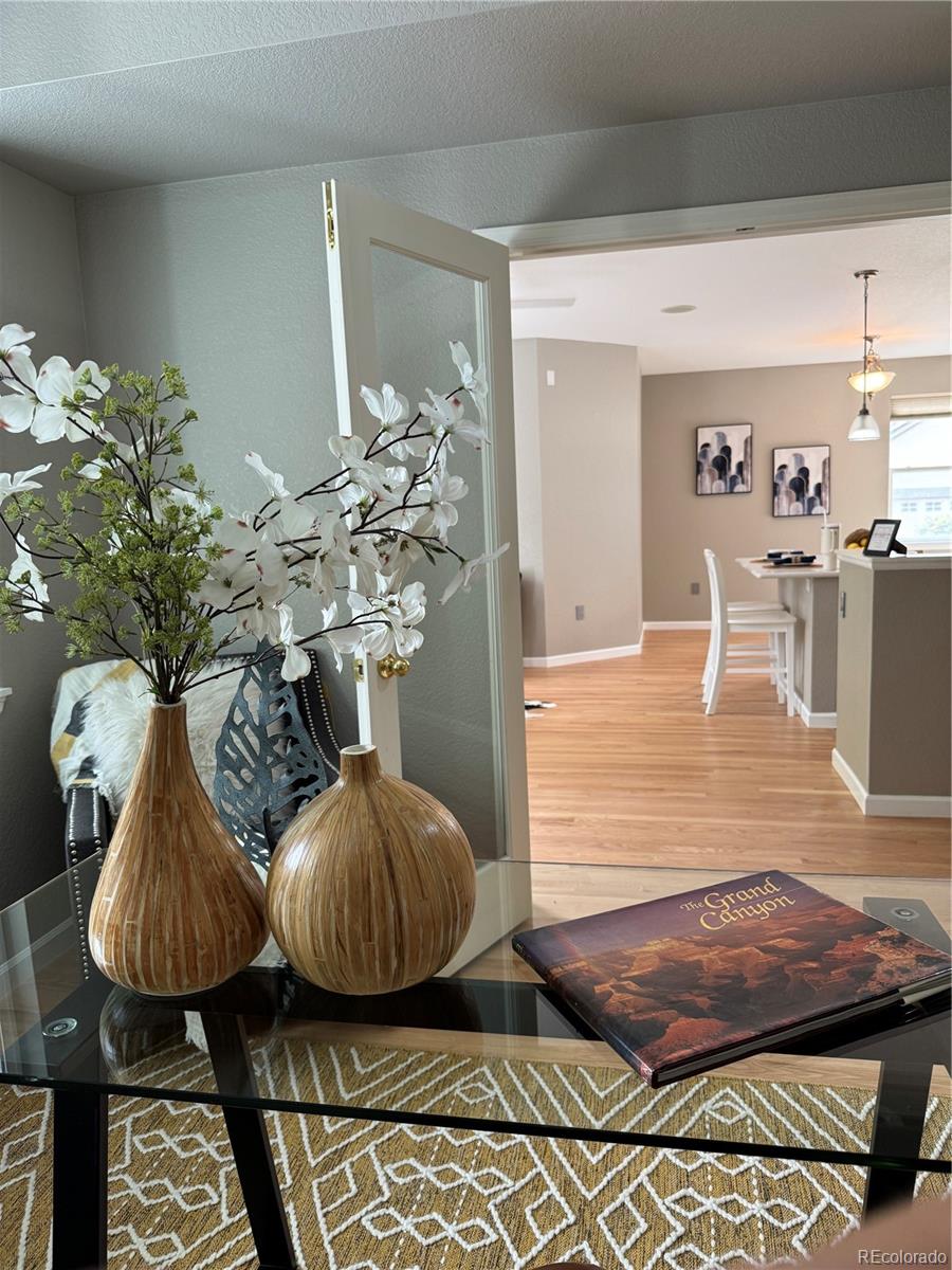 4501 Nelson Road, Unit 2104 Longmont, CO 80503 - Photo 14 of 29 a view of a dining room with furniture