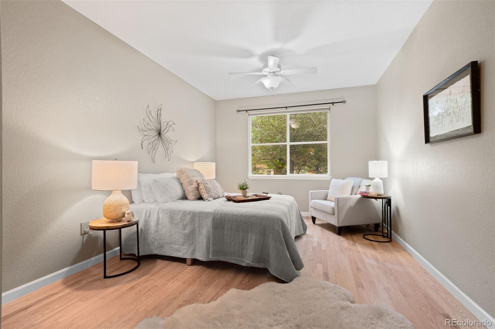 4501 Nelson Road, Unit 2104 Longmont, CO 80503 - Photo 9 of 29 a bedroom with bed and window