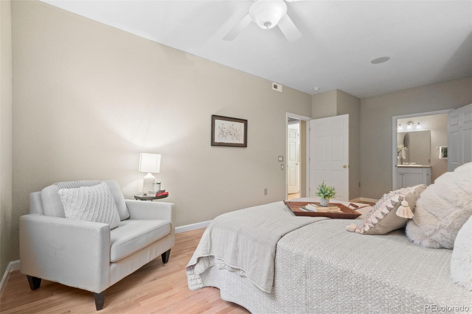 4501 Nelson Road, Unit 2104 Longmont, CO 80503 - Photo 10 of 29 a bedroom with a bed and a couch