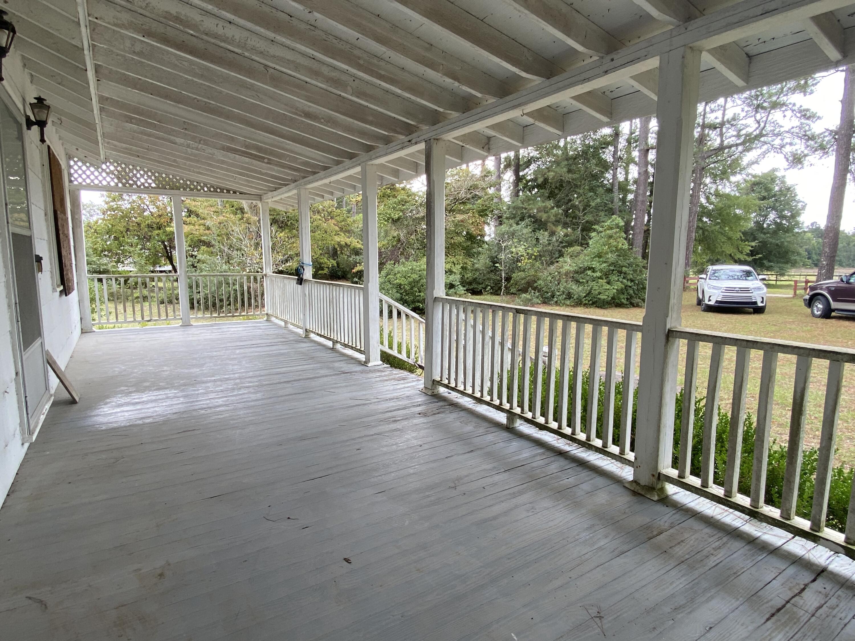 202 Old Cemetery Road Jamestown, SC 29453 - Photo 2 of 24 Front porch for entertaining!