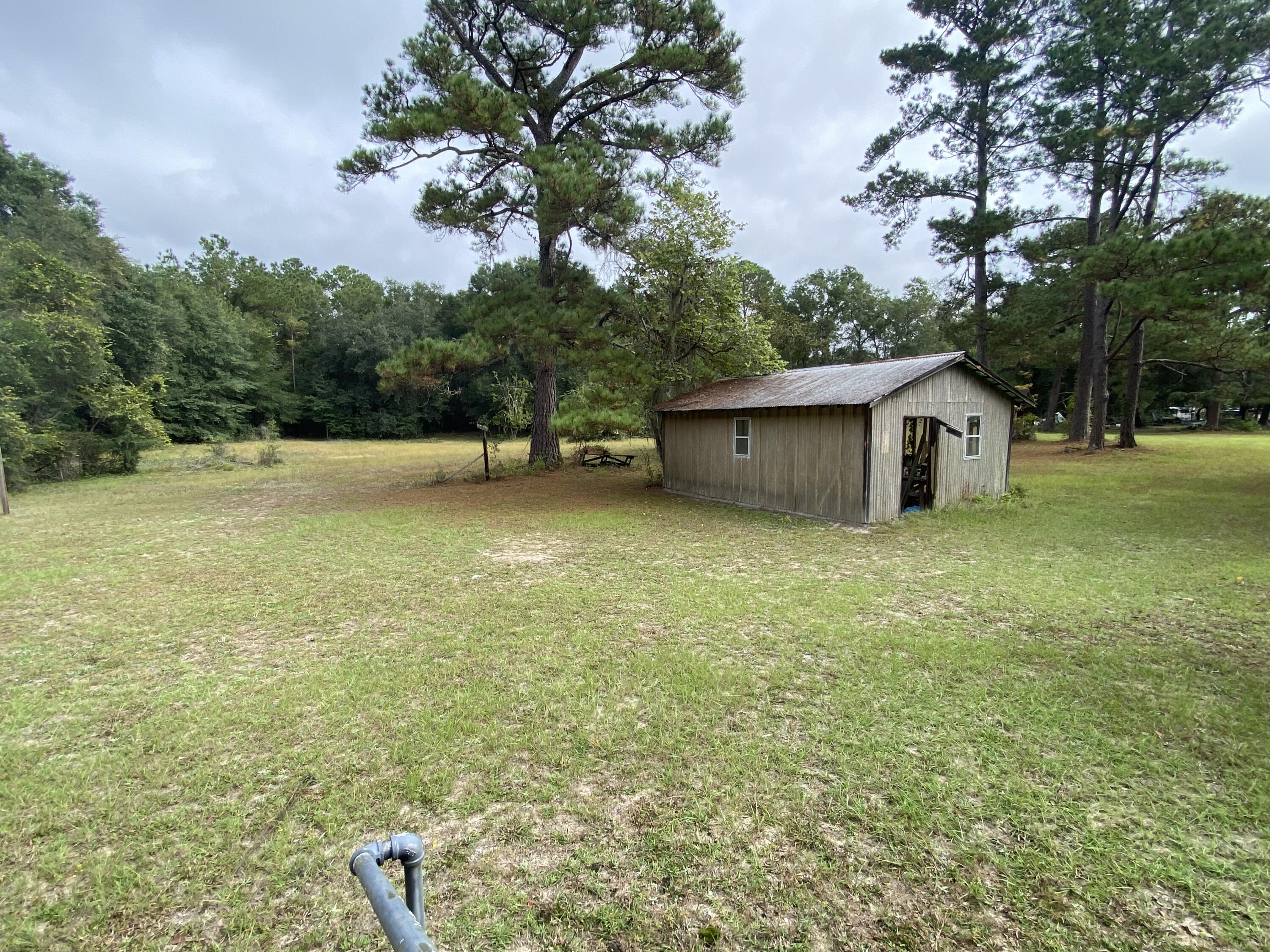 202 Old Cemetery Road Jamestown, SC 29453 - Photo 22 of 24 One of 2 outbuildings