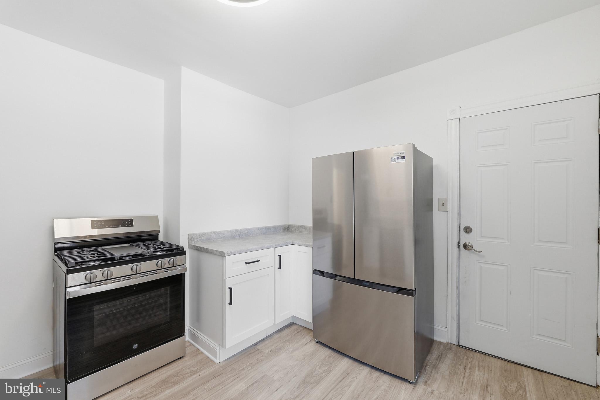 357 West 2nd Street Moorestown, NJ 08057 - Photo 20 of 23 a kitchen with a stove and a refrigerator