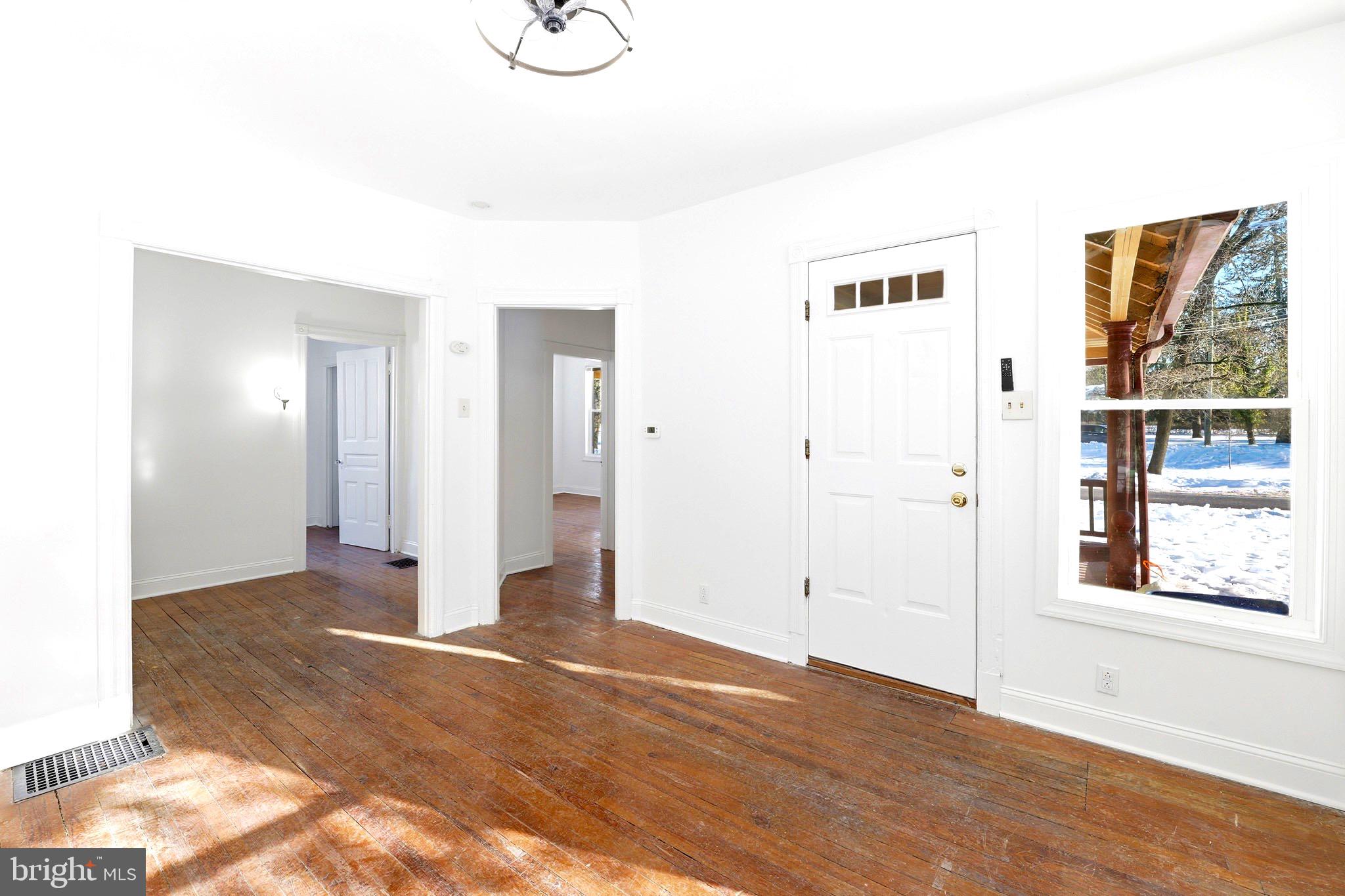 357 West 2nd Street Moorestown, NJ 08057 - Photo 3 of 23 a view of a room with wooden floor and window