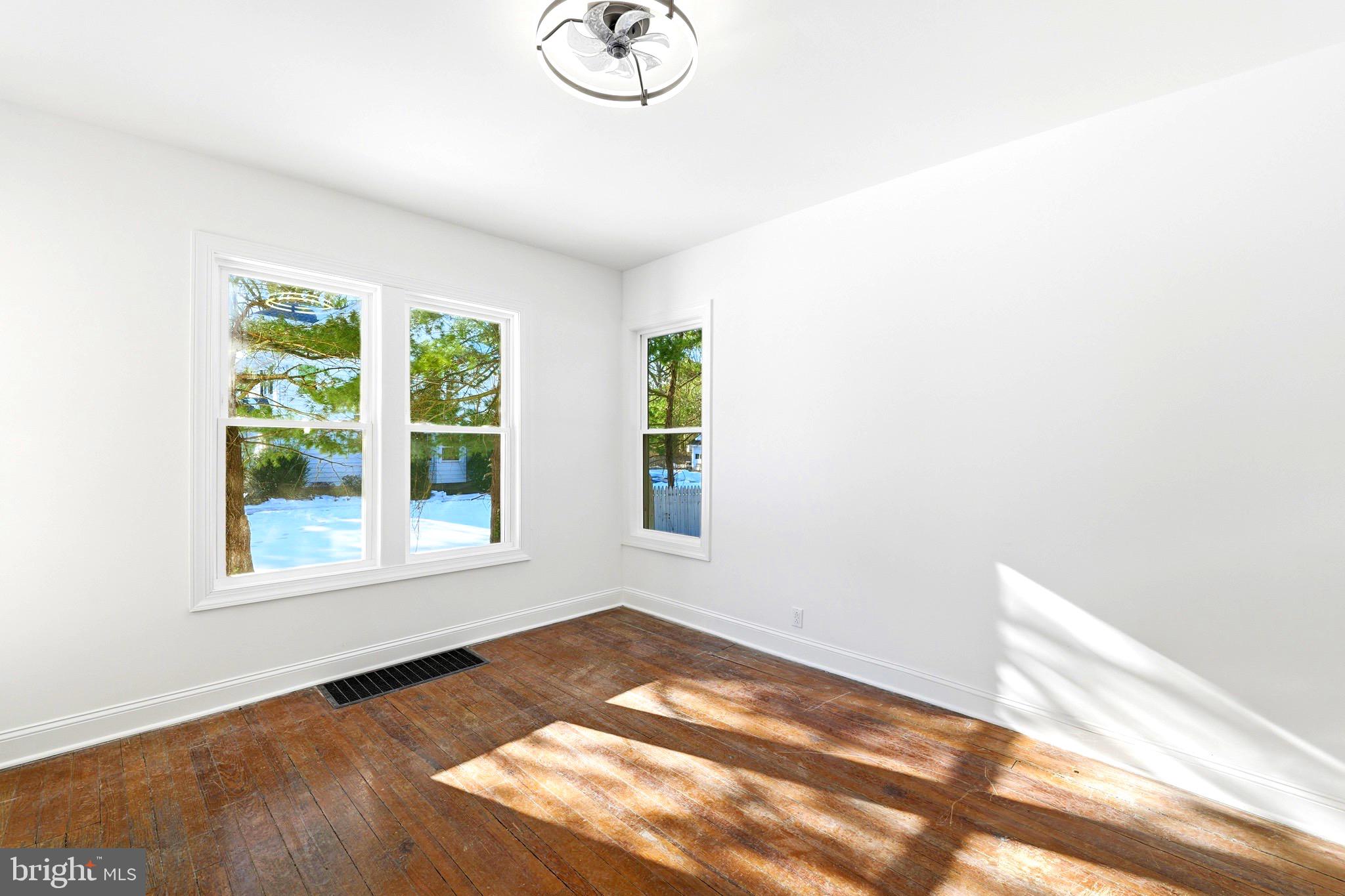 357 West 2nd Street Moorestown, NJ 08057 - Photo 5 of 23 a view of a livingroom with wooden floor and a window