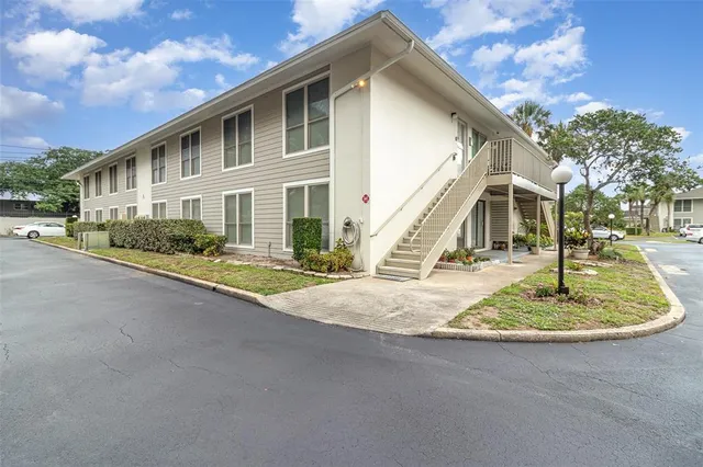 a view of a swimming pool and a yard