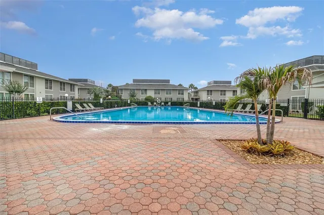 a picture of a wall with a white refrigerator