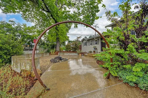 a view of a swimming pool with a patio