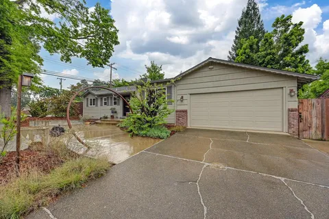 a house view with a backyard space