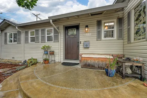 a view of a house with patio