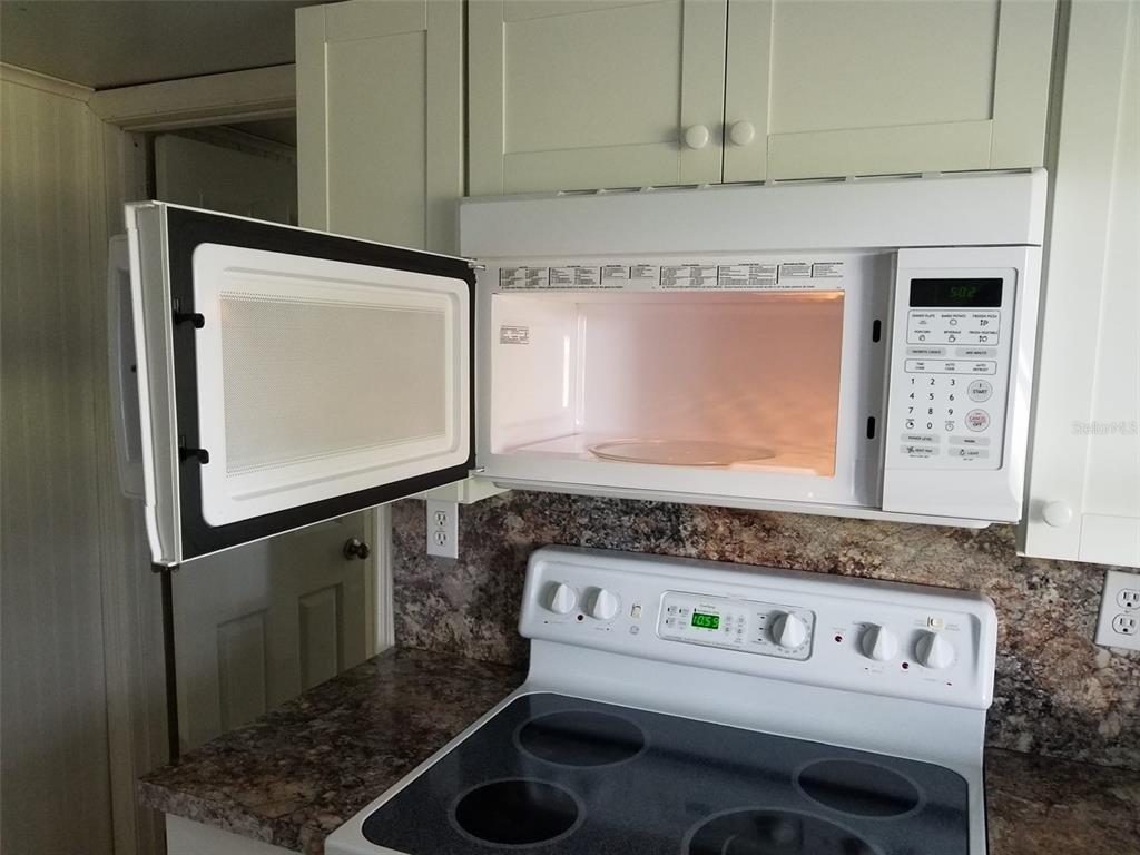 6275 Highway 441 Okeechobee, FL 34974 - Photo 11 of 18 a bathroom with a sink and a mirror