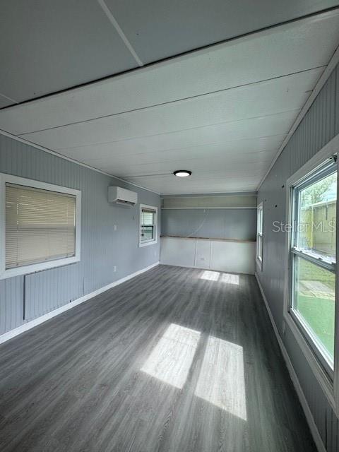 6275 Highway 441 Okeechobee, FL 34974 - Photo 15 of 18 a view of empty room with wooden floor and fan