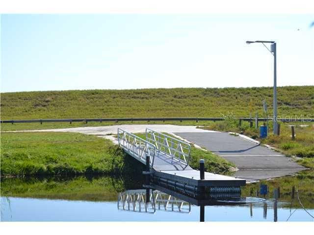 6275 Highway 441 Okeechobee, FL 34974 - Photo 18 of 18 a view of a terrace with a garden