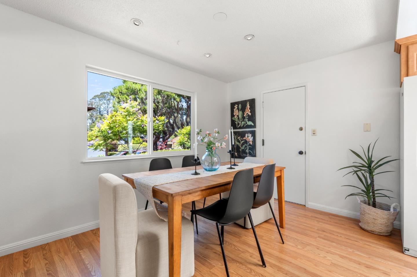 221 Segre Place Santa Cruz, CA 95060 - Photo 15 of 41 a view of a dining room with furniture window and outside view