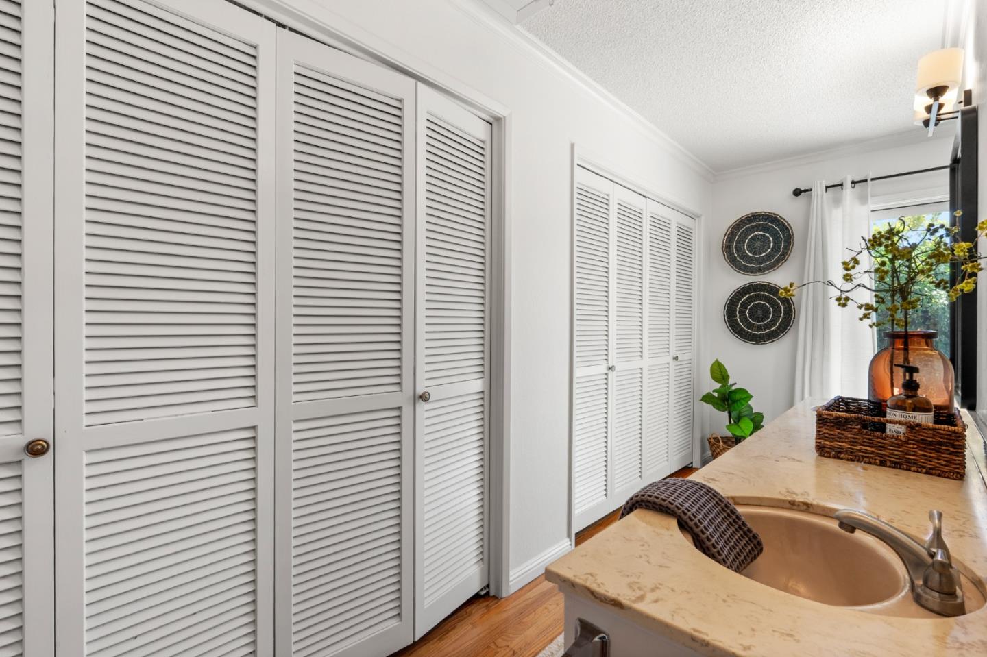 221 Segre Place Santa Cruz, CA 95060 - Photo 23 of 41 a view of a bedroom that has a bed and a window in it
