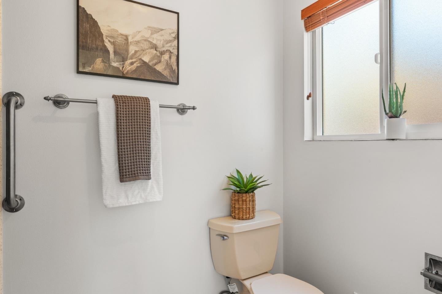 221 Segre Place Santa Cruz, CA 95060 - Photo 26 of 41 a bathroom with a toilet and a window