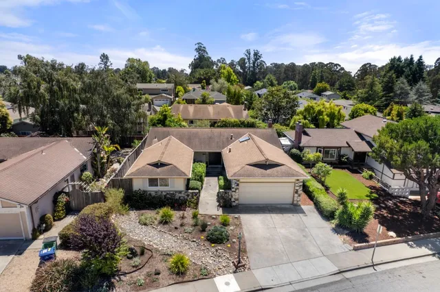 a aerial view of a house with a garden