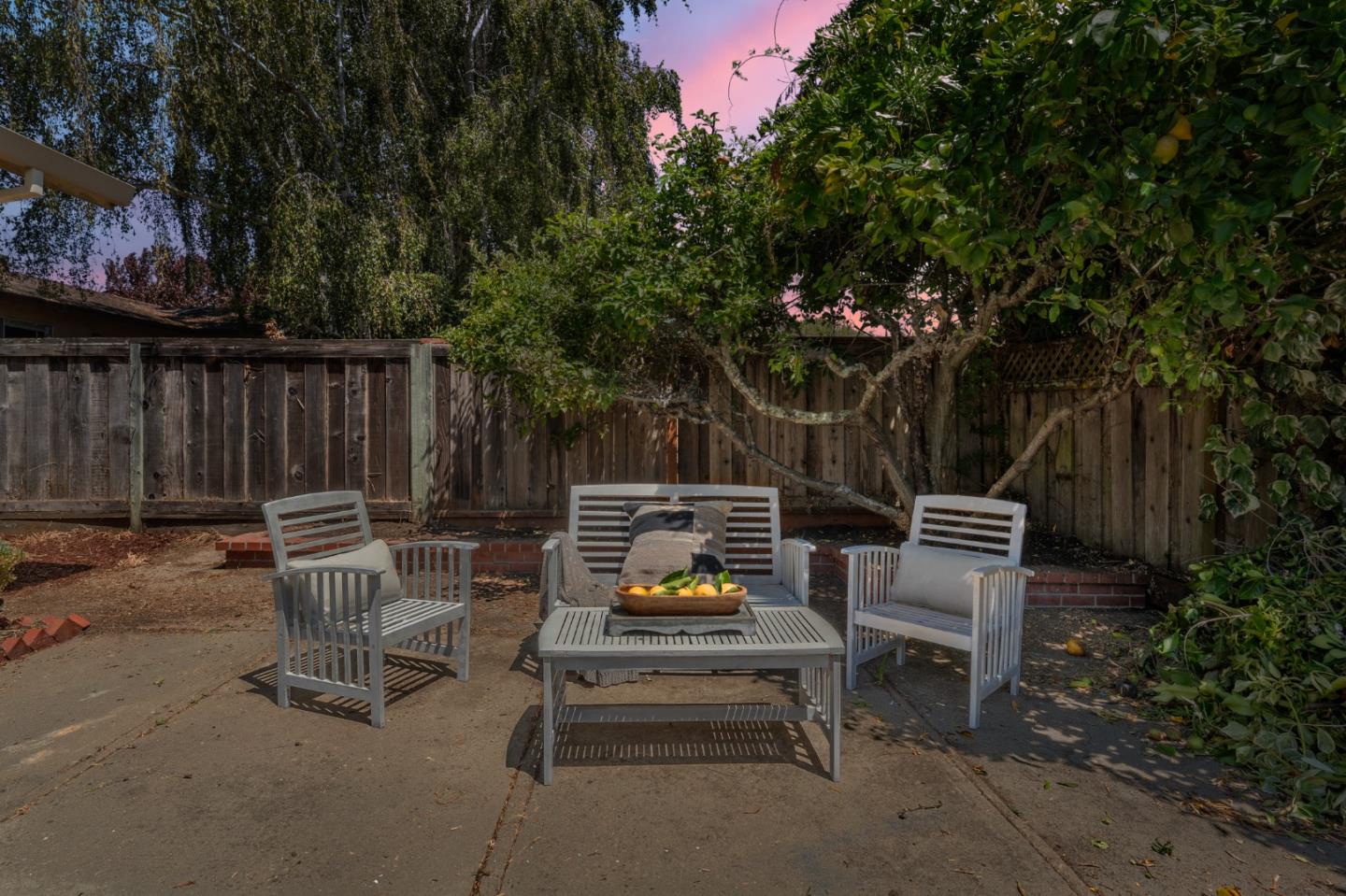 221 Segre Place Santa Cruz, CA 95060 - Photo 40 of 41 a view of a chairs and tables in the back yard of the house