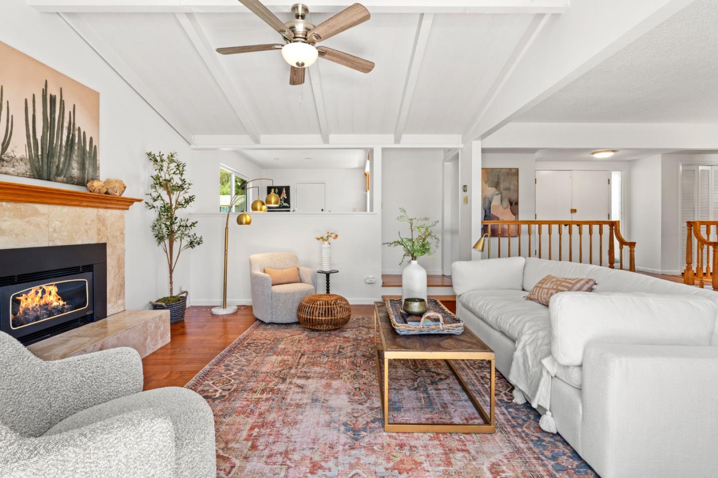 221 Segre Place Santa Cruz, CA 95060 - Photo 6 of 41 a living room with furniture fireplace and a fireplace