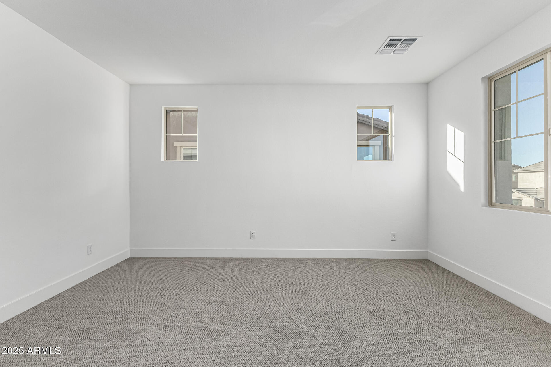 21494 East Timberline Road Queen Creek, AZ 85142 - Photo 17 of 32 an empty room with a window