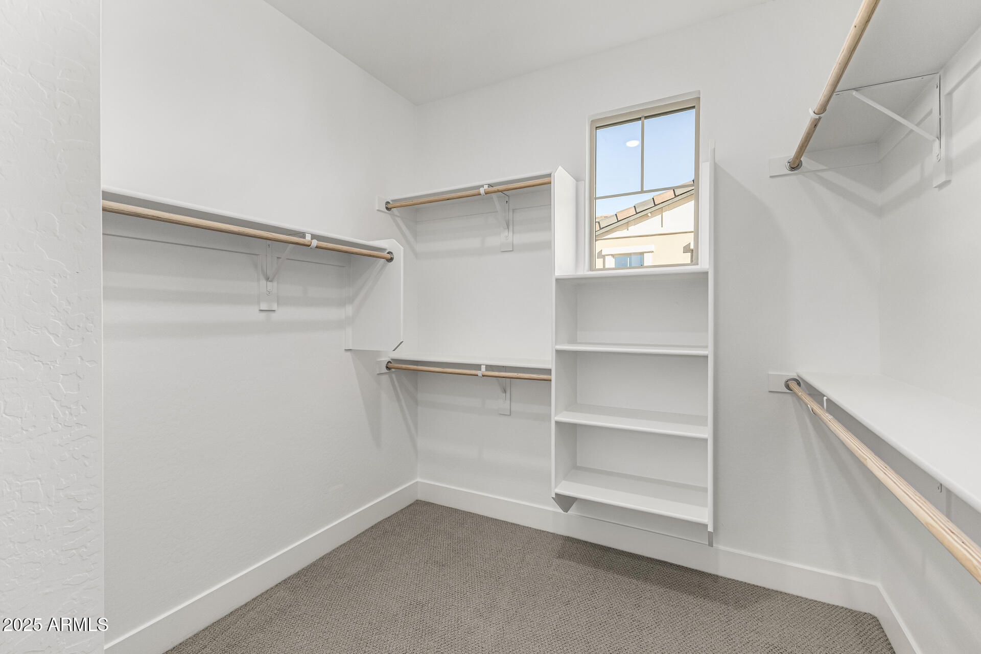 21494 East Timberline Road Queen Creek, AZ 85142 - Photo 19 of 32 a view of an empty walk in closet
