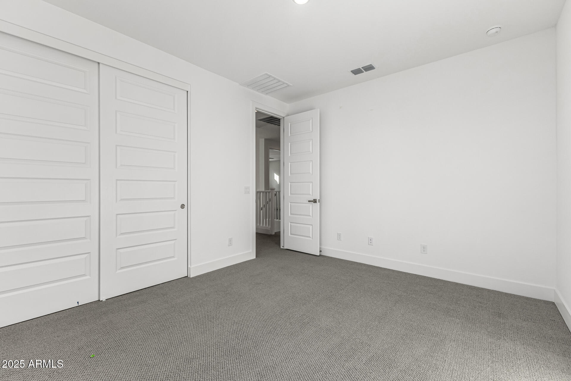 21494 East Timberline Road Queen Creek, AZ 85142 - Photo 23 of 32 an empty room with closet area
