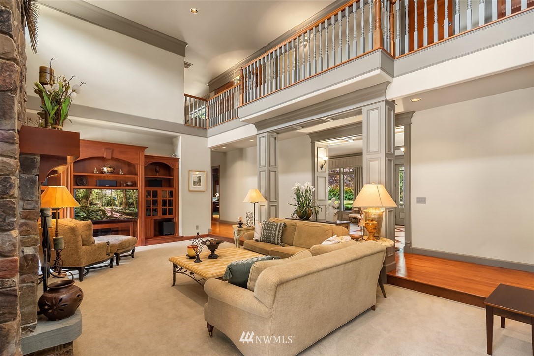 3114 220th Street Southeast Bothell, WA 98021 - Photo 12 of 39 a living room with furniture and a large window