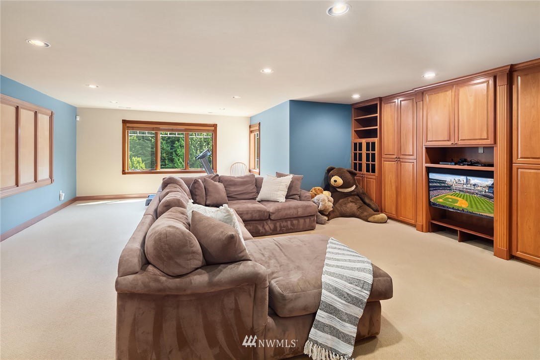 3114 220th Street Southeast Bothell, WA 98021 - Photo 26 of 39 a living room with furniture and a window