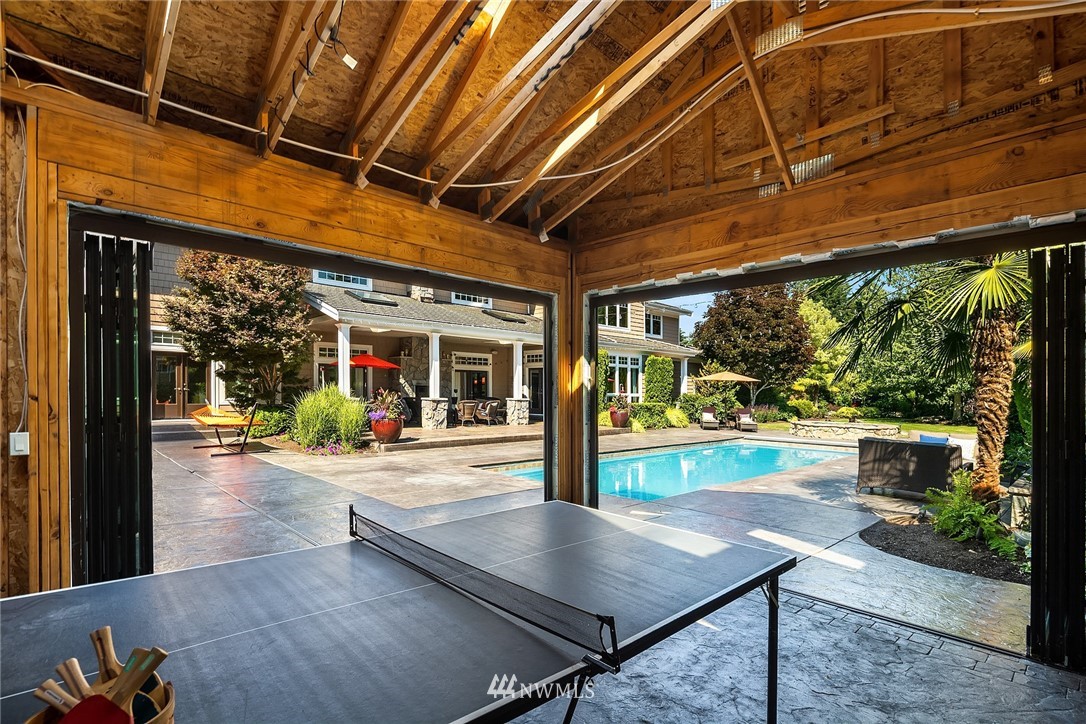 3114 220th Street Southeast Bothell, WA 98021 - Photo 31 of 39 a view of a porch with furniture and a backyard
