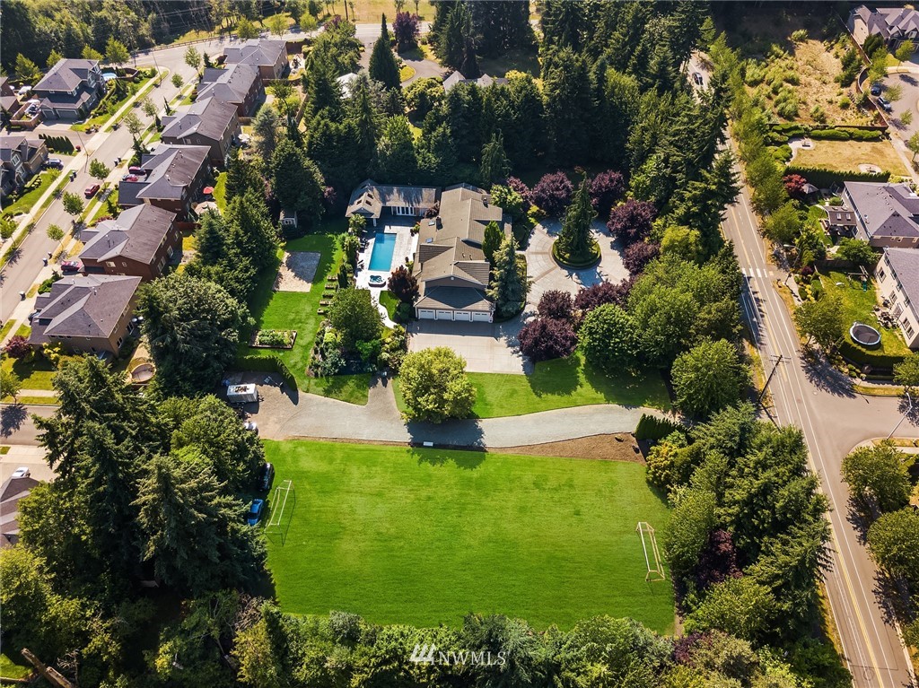 3114 220th Street Southeast Bothell, WA 98021 - Photo 33 of 39 an aerial view of residential houses with outdoor space and trees