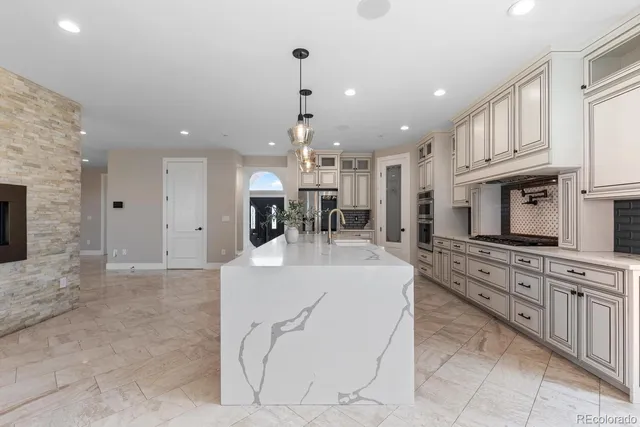 a sink with a table and a mirror
