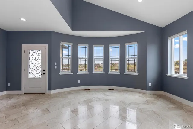 a bathroom with a double vanity sink toilet and shower