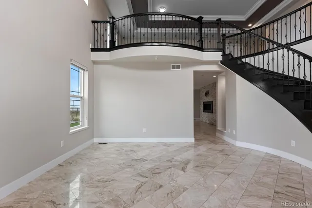 a large bathroom with a large tub and sink