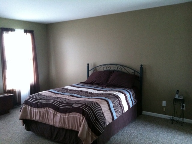 125 Cobblestone Court DeKalb, IL 60115 - Photo 13 of 25 a bedroom with a bed and window
