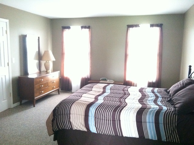 125 Cobblestone Court DeKalb, IL 60115 - Photo 14 of 25 a bedroom with a bed and a window