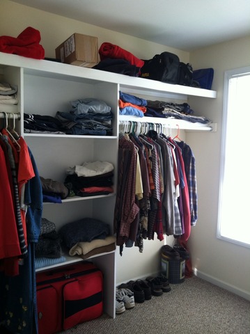 125 Cobblestone Court DeKalb, IL 60115 - Photo 15 of 25 a view of walk in closet with clothes and shoes