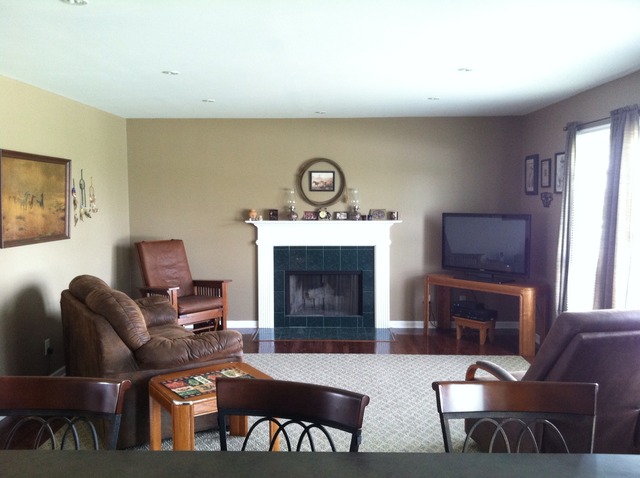 125 Cobblestone Court DeKalb, IL 60115 - Photo 3 of 25 a living room with furniture and a fireplace