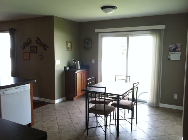 125 Cobblestone Court DeKalb, IL 60115 - Photo 7 of 25 a view of a dining room with furniture and window