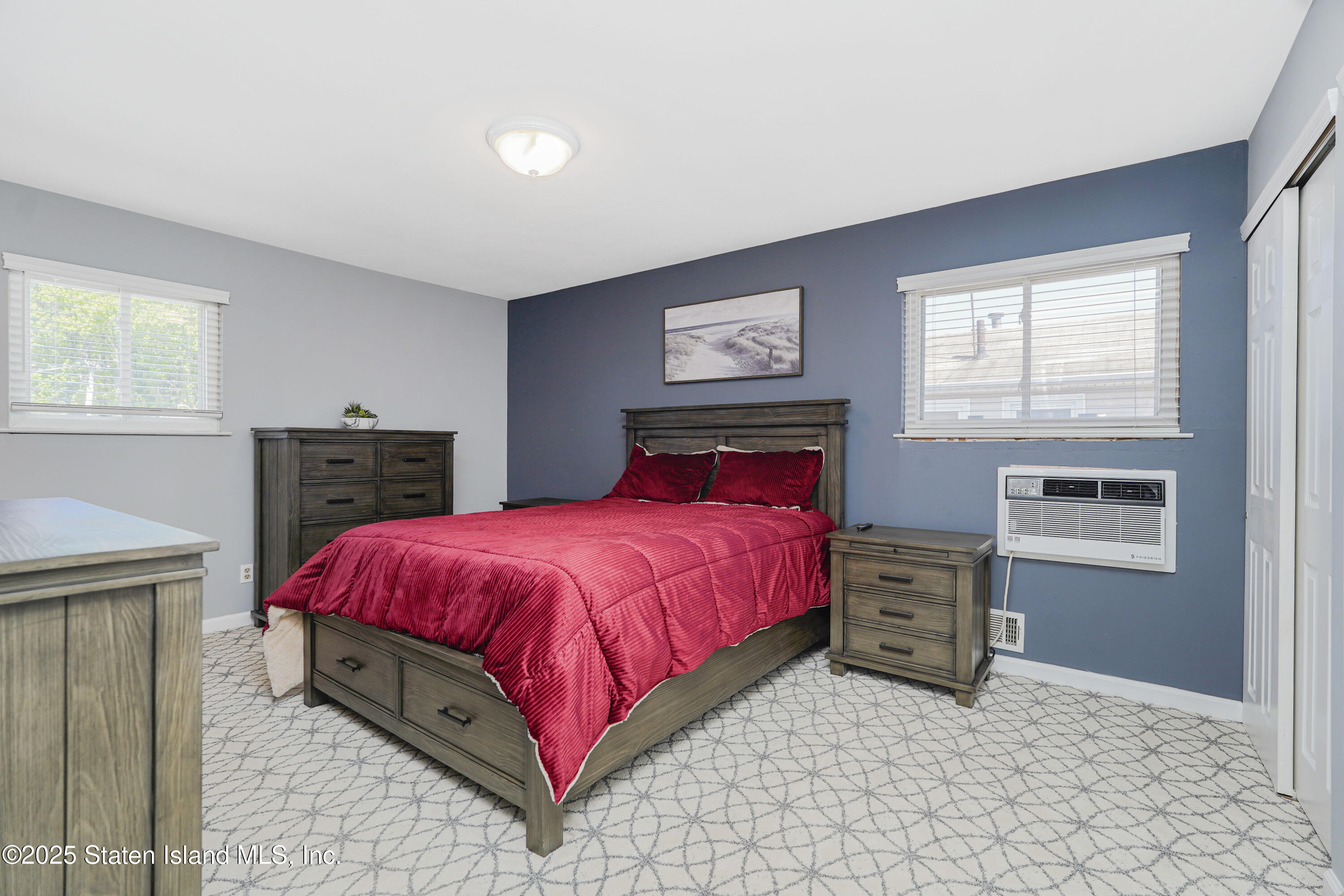 80 Gold Avenue Staten Island, NY 10312 - Photo 13 of 33 a bedroom with a bed and dresser